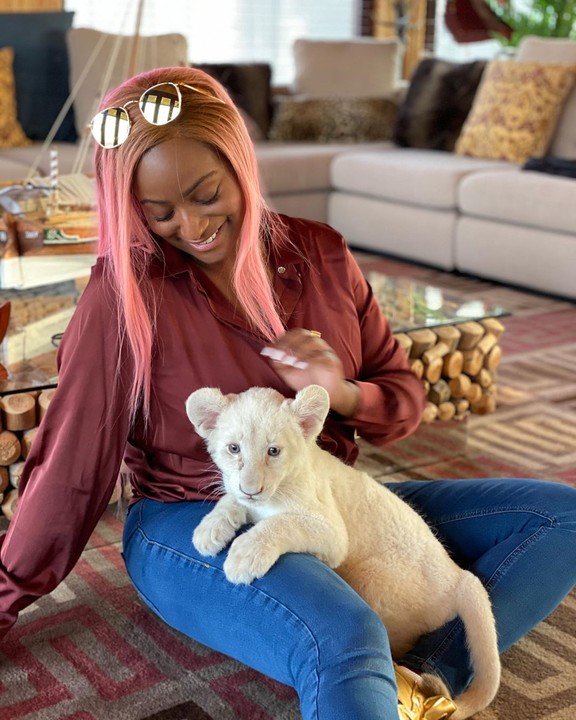 DJ Cuppy Feeds A Lion Named After Her - Celebrities - Nigeria